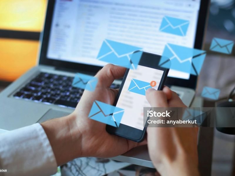 email marketing concept, person reading e-mail on smartphone, receive new message